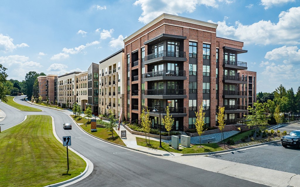 a view of a building on the side of a road