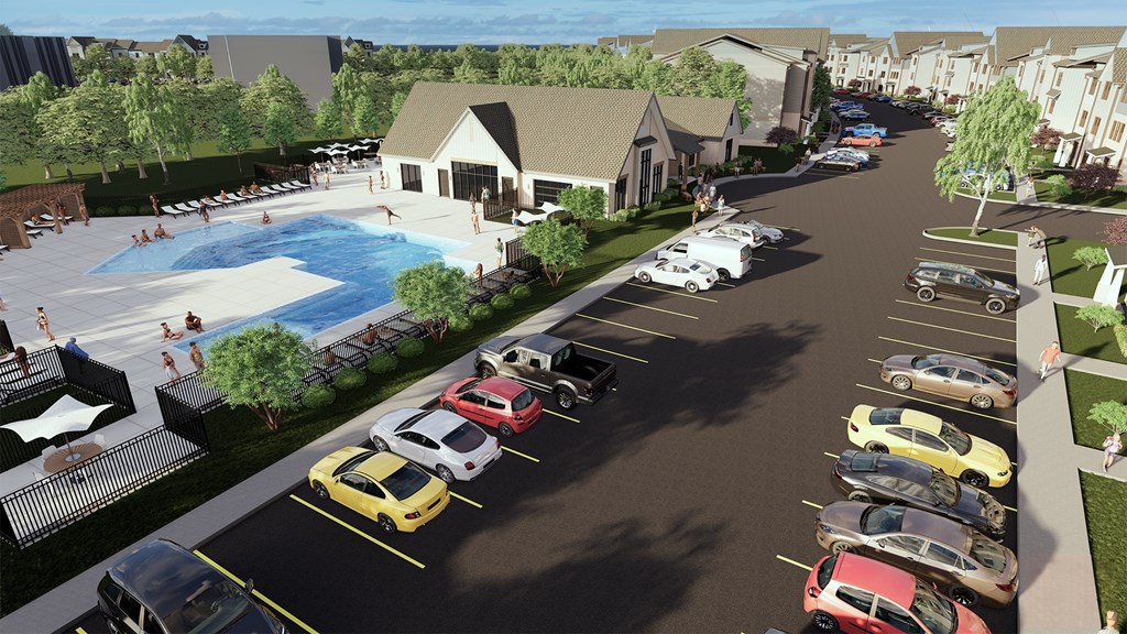 Luxury Apartments in West Oakland Park, TN with In-Unit Washer and Dryer - Vintage Johnson City -  A Swimming Pool Surrounded by Lounge Chairs and Lush Greenery.