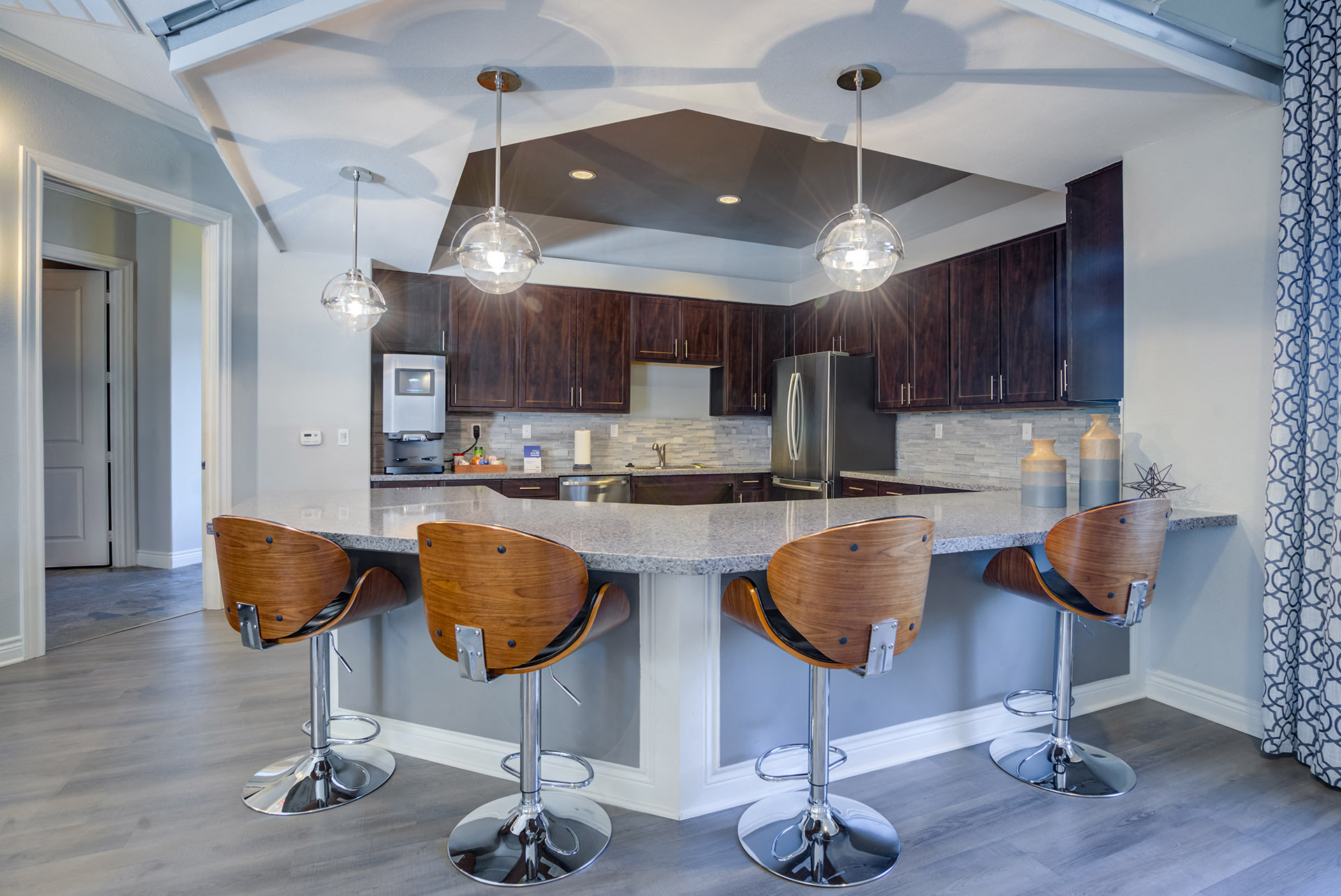 Clubhouse Kitchen Breakfast Bar with Stoolsat Residence at Midland, Texas, 79706