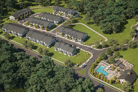 A bird's eye view of a residential area with houses and a swimming pool.