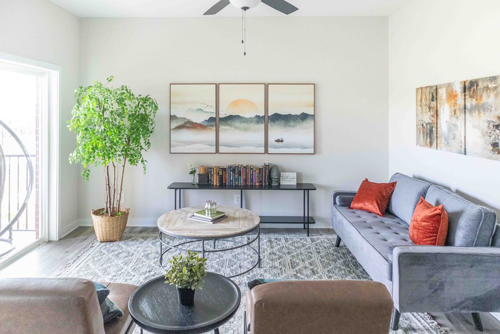 a living room with a couch and a table