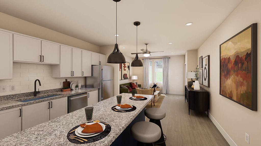 a kitchen and dining room with a granite counter top