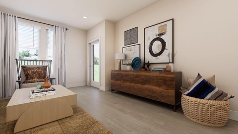 a living room with a couch and a dresser