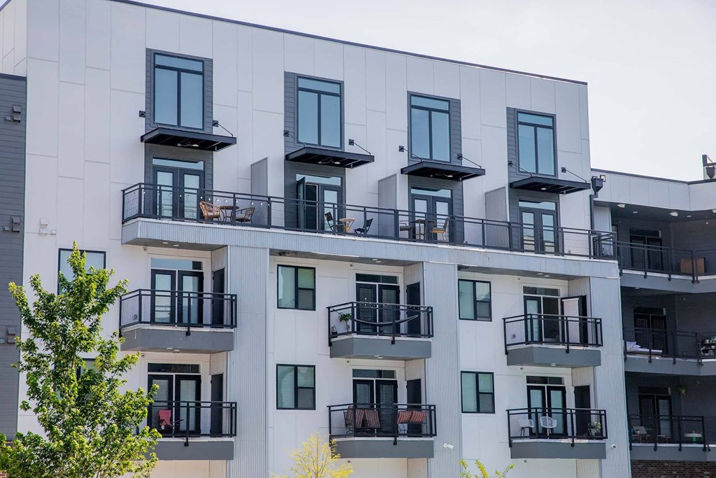 a picture of a building with multiple balconies