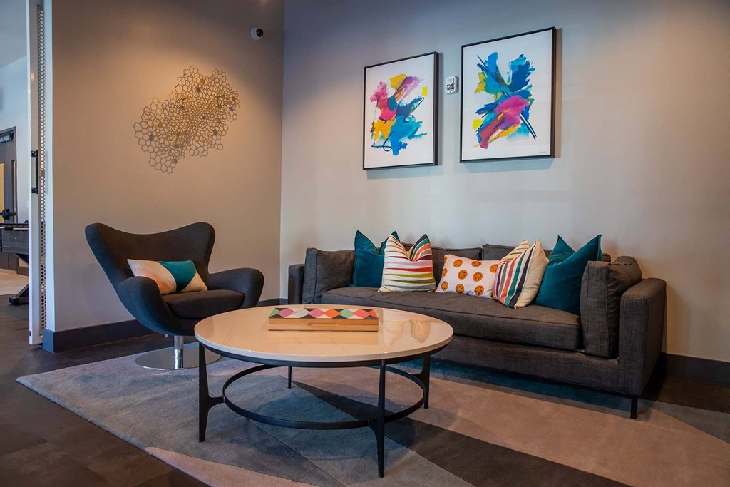 clubhouse room with a couch chair and coffee table