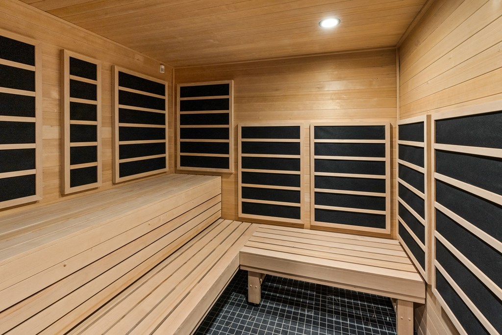 a large room filled with wooden shelves in a building