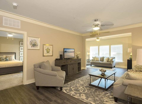 a living room with a couch and a table