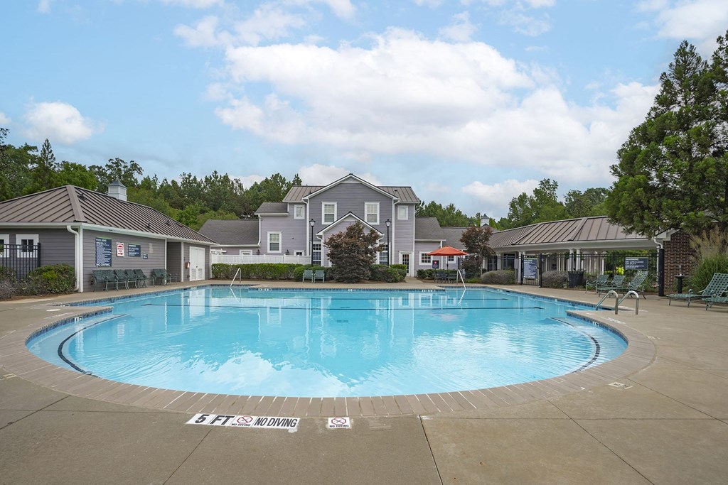 A large outdoor swimming pool with the words "Bank of America" on the ground.