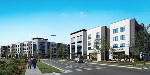 A modern apartment complex with the name "Bignage" on the front.