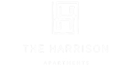 The image shows a logo with the text "The Harrison Apartments" and a graphic of a door with a window.