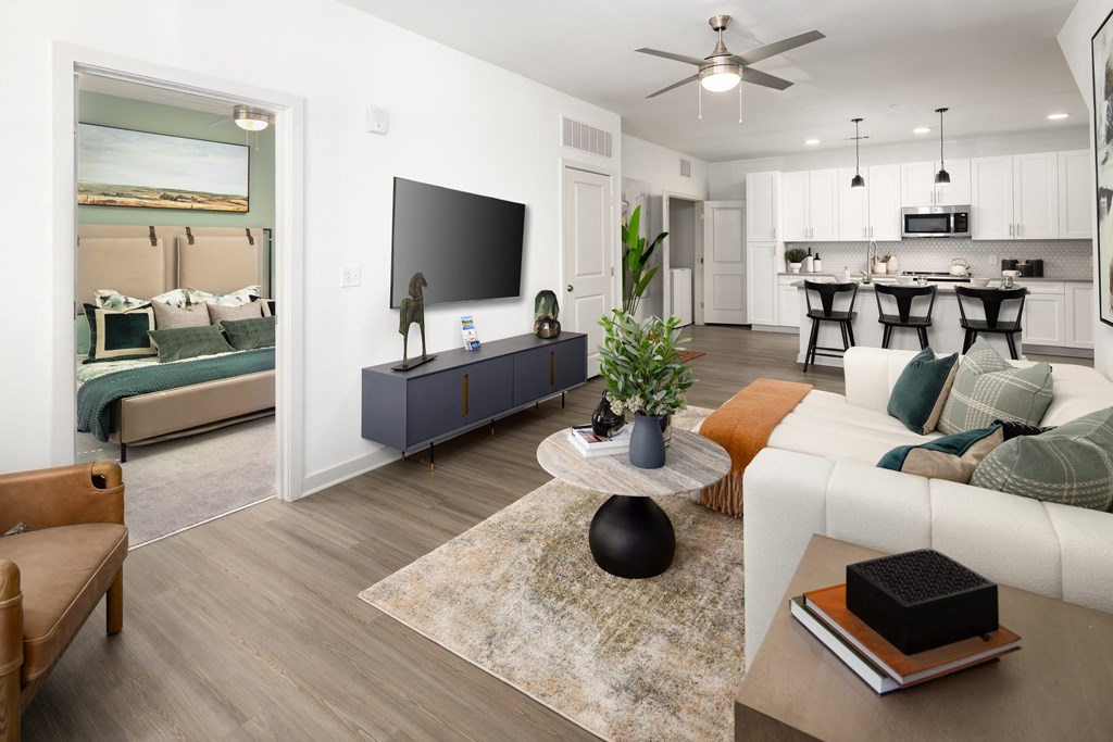 a living room with a couch and a table