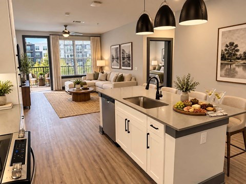 A modern kitchen with a dining area and a living room in the background.