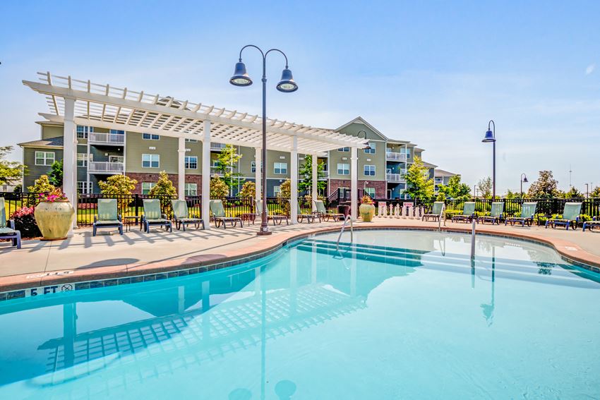 the swimming pool at the preserve at polo ridge apartments