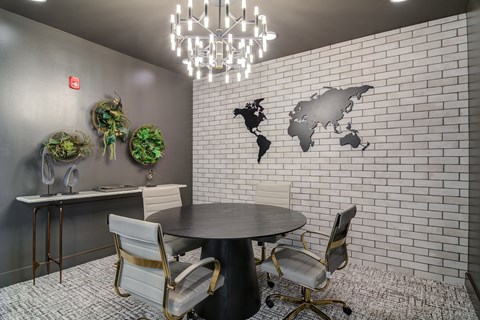 A modern dining room with a world map on the wall.