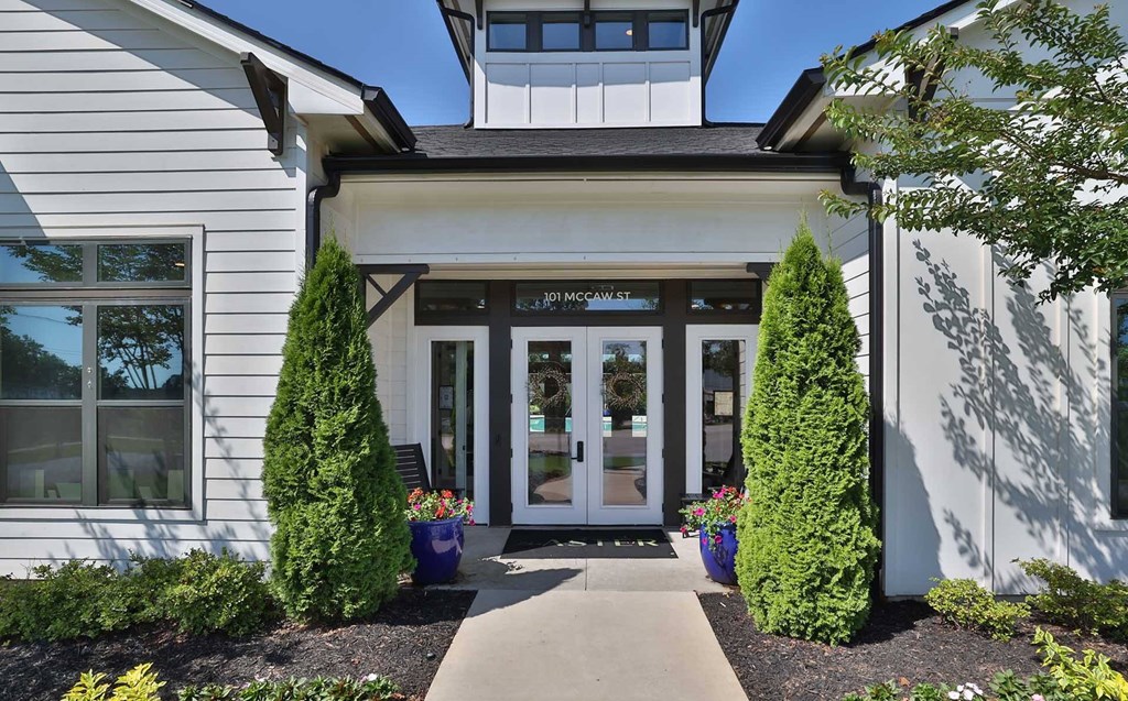 The entrance to a building with a sign that reads "McGaw Street".