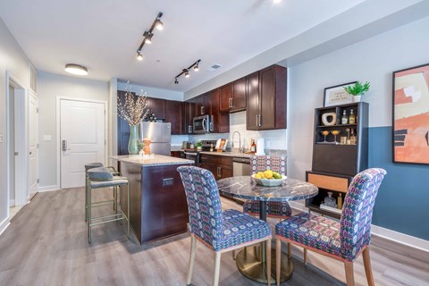 kitchen and dining area at the central apartments near downtown minneapolis mn 55408