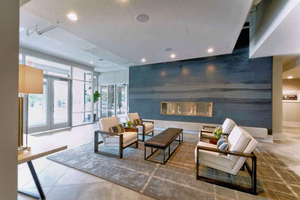 the preserve at ballantyne commons living room with a fireplace