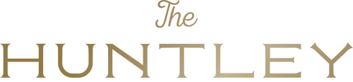 a logo for the hungry hunter on a green background