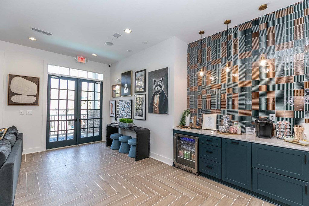 the lobby of a building with a counter and a door