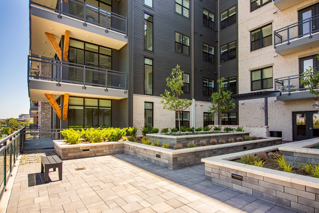 Studios in Downtown Memphis, TN - The Landing - Terrace with Bench and Planters.