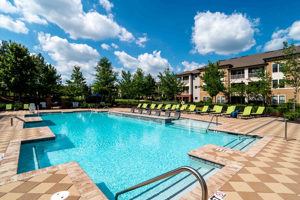 our apartments have a large pool with lounge chairs