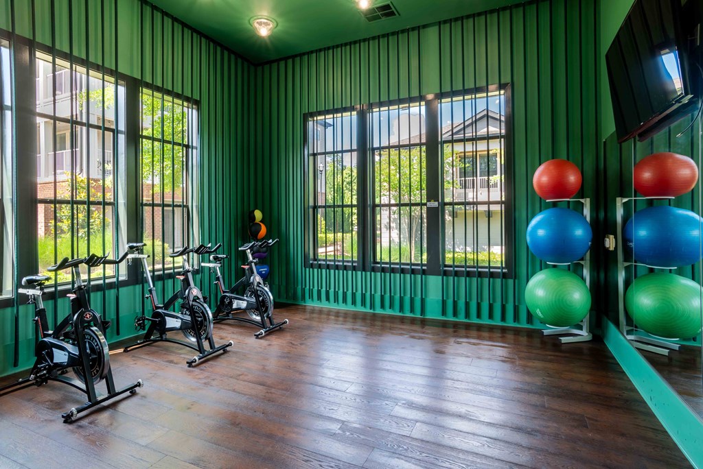 Pet-Friendly Apartments in Greenville, SC - Velo Verdae - Fitness Center with Green Walls, Exercise Balls, and Stationary Bikes