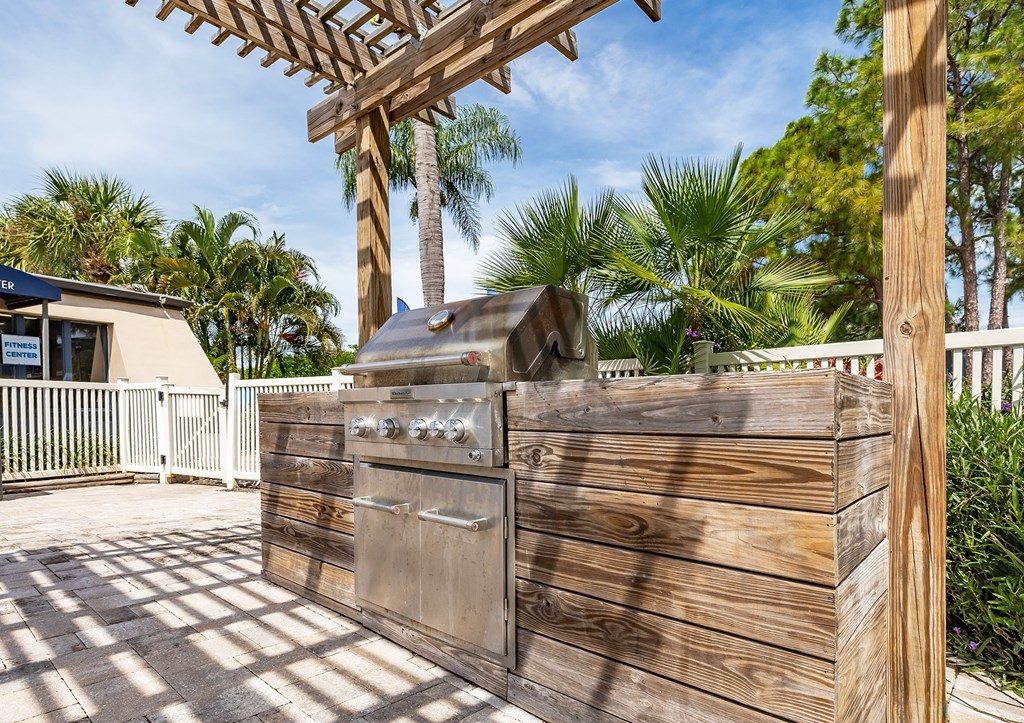 A wooden fence with a mailbox on it at Waterview at Rocky Point, Tampa, FL