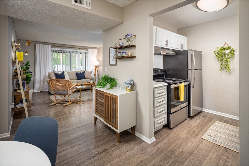 our apartments offer a living room with a couch and a coffee table at Waterview at Rocky Point, Florida