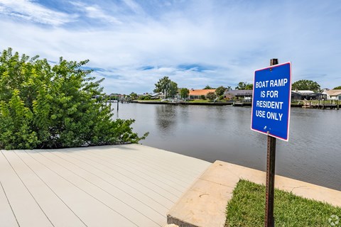 A sign on a boat ramp states that it is for resident use only.
