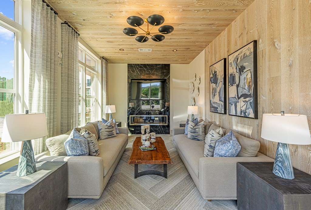 a living room with couches and a coffee table