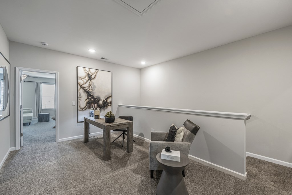 a living room with a couch and a table