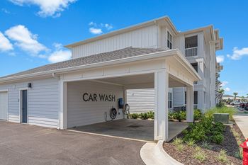 a car wash in front of a building