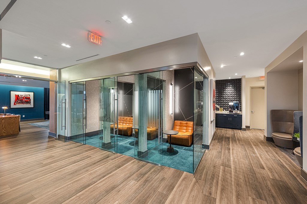 Three-Bedroom Luxury Apartments In Atlanta, GA - Venue Brookwood - Phone Booth Offices With Glass Walls And Coffee Bar.