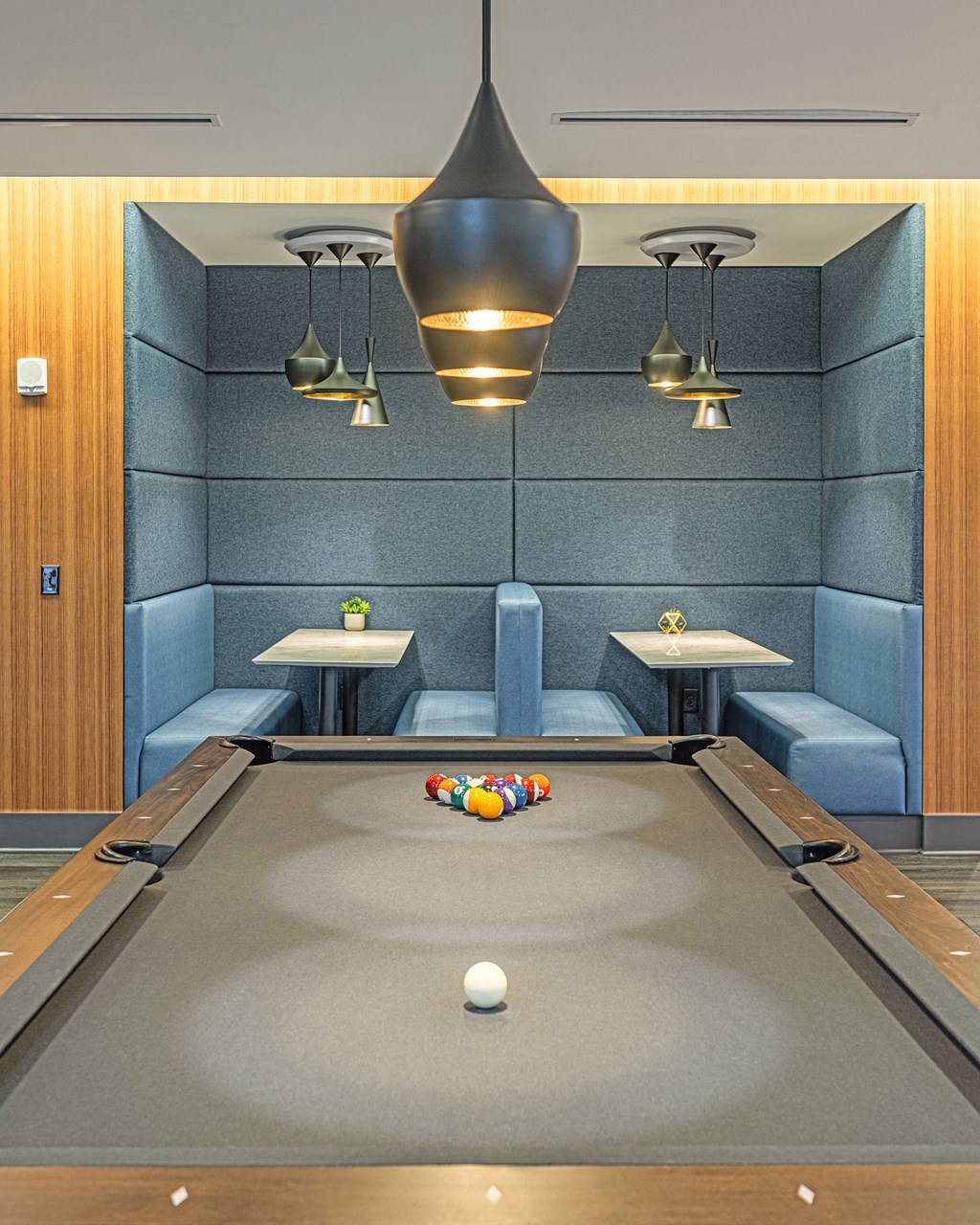 a billiards table in a game room