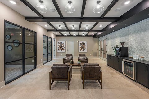 a conference room with a table and chairs