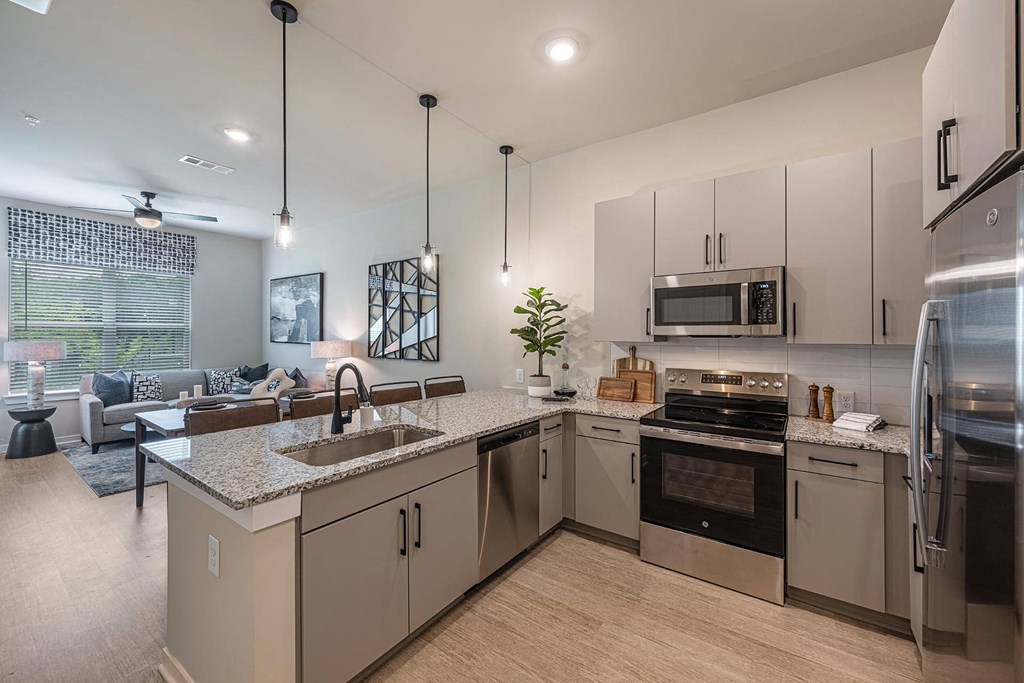 a view of the lobby of a hotel with geometric wallpaper
