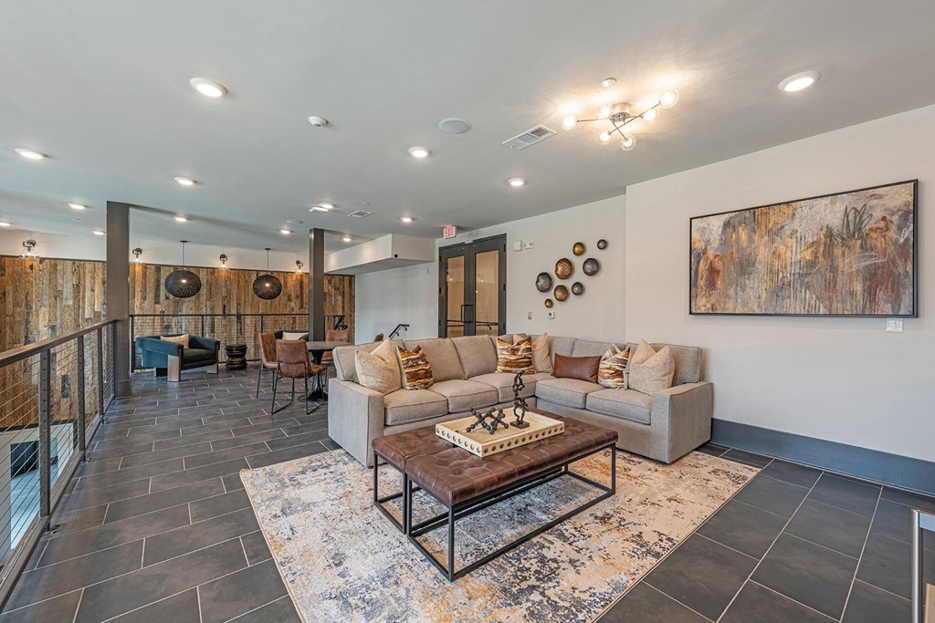 a living room with a couch and a table