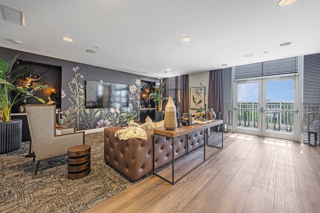 a living room with a couch and a tv