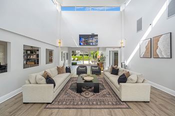 a living room with a large couch and a coffee table