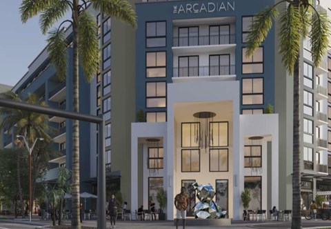 The front of a hotel named #ARGADIAN with a large mural on the ground.