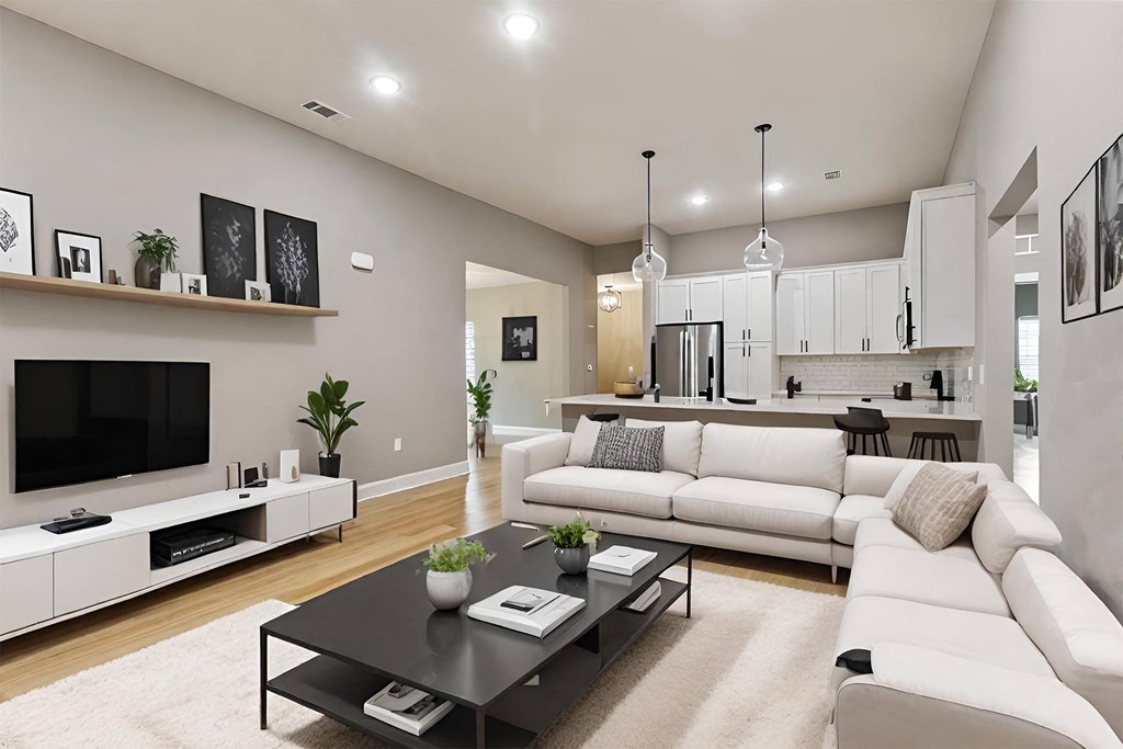 a living room with a couch and a table