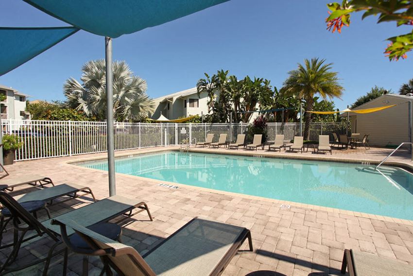 Too much sun can be a bad thing, good thing we have a shady spot just for you at Coral Club, Bradenton, Florida - Photo Gallery 1
