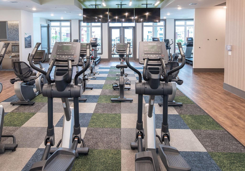 Lewisville, TX Apartments for Rent - Hebron 121 Station Fitness Center with Excercise Bikes, Ellipticals, Treadmills, and More
