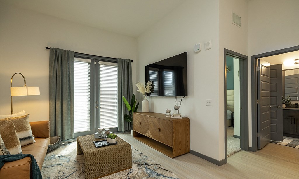 a rendering of a living room with pink and blue lights