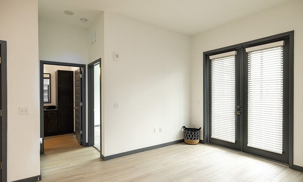 a living room with a wall that has a decoration on it