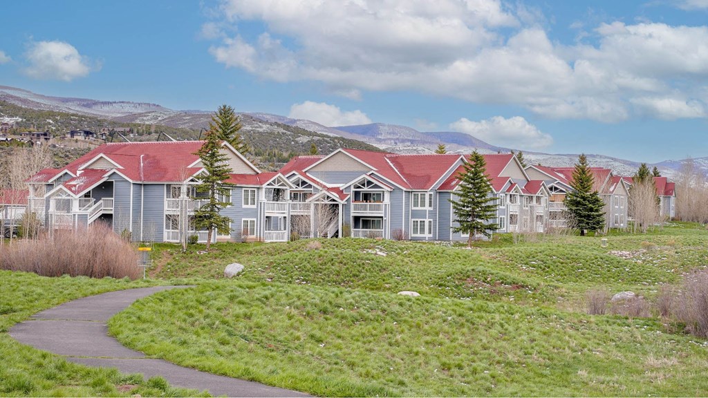 a building with a winding road in front of it
