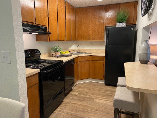 Sleek black appliances add a modern touch to the kitchen at Lake in the Woods, Melbourne