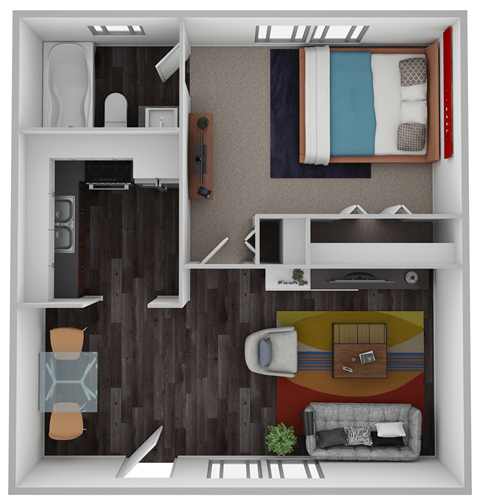 A top-down view of a small apartment with a bed, couch, and kitchen area.