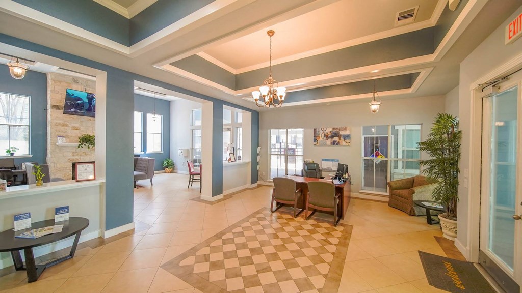 a dining room with a table and chairs in a lobby
