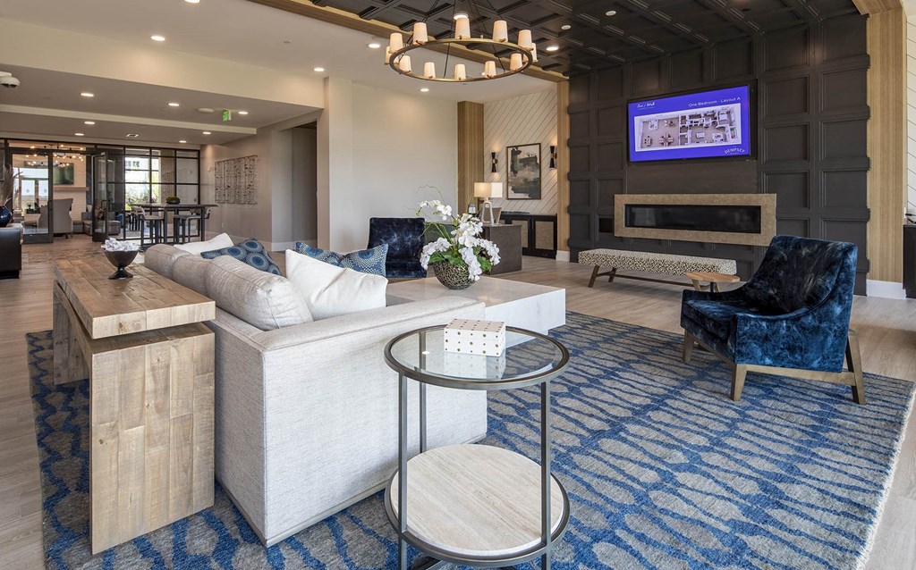 a living room with a couch and a table